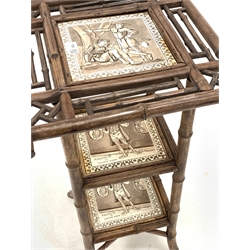 Victorian Aesthetic style bamboo occasional table, with three tiers each inset with a tile depicting a scene from 'Twelfth Night' by 'E. Smith & Co.'