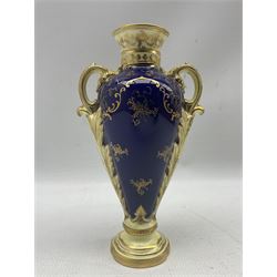 Early 20th century Coalport twin handled vase, hand painted with landscape of 'Loch Earn' in oval reserve, on cobalt blue and gilt ground, printed and written marks beneath, H20.5cm 