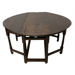 17th century oak drop-leaf dining table, oval top raised on turned supports with double gate-leg action on each side, united by stretchers with carved rails