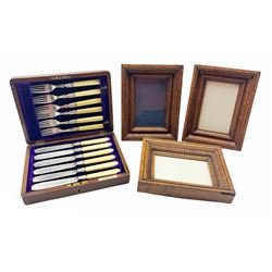 Pair of rectangular oak picture frames, aperture 15cm x 9cm, a similar oak frame with reeded border, together with an early 20th century mahogany canteen of fish knives and forks with ivory handles, retailed by E. H. Mason Jeweller Middlesbrough (4) 
