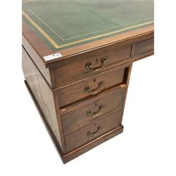 19th century mahogany twin pedestal desk, moulded rectangular top with green leather inset top, fitted with nine drawers, on plinth base
