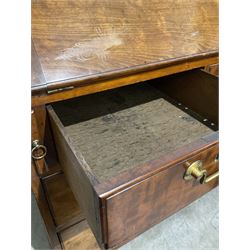 Georgian mahogany bureau, the fall front opening to reveal fitted interior over two short and two long drawers, raised on bracket supports