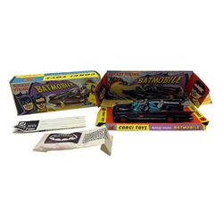 Corgi Toys rocket firing Batmobile No.267, in black gloss, rubber tyres with gold hubs and red bats, blue tinted windscreen, inscribed beneath 'Batman Batmobile', boxed with illustrated card stand, orange missiles, instruction envelope and leaflet