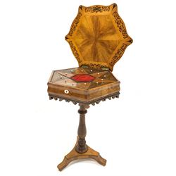 Early 20th century Regency design fruitwood veneered sewing table, serpentine octagonal top with inlaid eight point star to centre and ebonised moulded edge, lifting to reveal interior fitted with twelve rosewood and other trinket boxes, shaped frieze and carved apron, raised on turned pedestal and trefoil base with chequered inlay, H77cm W57cm