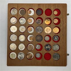 Fourteen drawer coin cabinet containing mostly Channel Islands and Isle of Man coinage including nineteen Bailiwick of Jersey silver one pound coins, Queen Victoria States of Jersey one thirteenth of a shilling coins 1866, 1870 and 1871, various Guernsey (Guernesey) one double, two doubles, four doubles and eight doubles coins, two Jersey Guernsey and Alderney 1813 one penny tokens, Isle of Man Queen Elizabeth II crown coins including 1976 'Centenary of the Horse Tram', 1979 'Tercentenary of Manx Coinage' etc some being in silver, 1980 Christmas fifty pence etc 