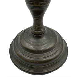 17th centruy turned bronze candlestick, with detachable sconce, baluster stem and domed circular base having incised leaf decoration, fitted for electricity, H27.5cm 