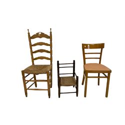 Three chairs of various different styles and sizes 