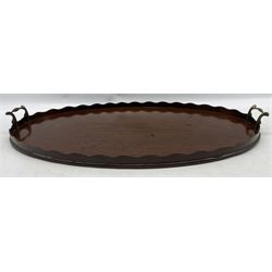 Edwardian mahogany oval tray with galleried border and brass handles W68cm