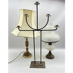 Brass oil lamp with fluted frosted glass shade and similar reservoir, a floor standing candelabra and ornate brass lamp with shade 