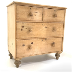  Victorian pine chest fitted with two short and two long drawers, with turned pull handles, raised on turned supports, W92cm, H91cm, D51cm  