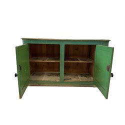 Victorian painted pine cupboard with two cupboard doors opening to reveal two adjustable shelves, raised on a plinth base 