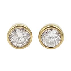 Pair of 9ct gold diamond stud earrings, hallmarked, total diamond weight 0.23 carat