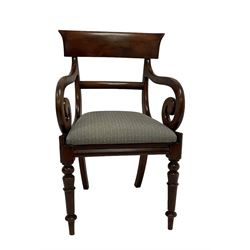 Near pair Regency period mahogany armchairs or carvers, shaped cresting rail, scrolled arm terminals, drop-in seat upholstered in blue lozenge patterned fabric, raised on turned supports