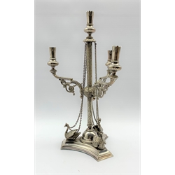 Victorian plated four branch candlestick with chased decoration, the triangular base with swan mounts H35cm