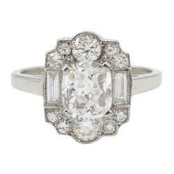 Platinum diamond ring, central old cushion cut diamond of approx 1.15 carat, with round brilliant cut and baguette cut diamond surround, stamped Plat