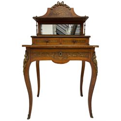 Early to mid-20th century French satinwood and marquetry Bonheur du Jour,  the raised shaped back with a gilt metal ribbon tied mount, projecting shelf with turned gilt metal supports over mirror back, fitted with two drawers, inlaid with musical instruments with ribbon and laurel leaf motifs, the top inlaid with trailing oak leaves and acorns with a central torch, gilt metal foliate moulded and twist edge mounts, the single drawer with a scrolling foliate inlaid front fitted with baize lined slide revealing storage well, cabriole supports mounted with putto and floral castings and foliate terminal caps