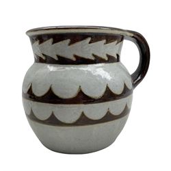 Danesby ware stoneware jug with scalloped banded design, printed W.T.L & S 1931 beneath H17cm 