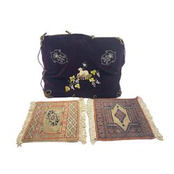 20th century velvet altar pillow centrally embroidered with 'Agnus Dei' Lamb of God, L58cm together with two oriental carpet squares (3) 