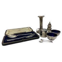 Pair of silver circular salts with blue glass liners London 1917, silver circular mustard pot, pepperette, candlestick and a cased christening spoon and fork 9.5oz