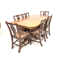 Georgian style mahogany twin pedestal dining table, with cross banded top, (100cm x 160cm, H75cm) and eight (6+2) Chippendale style chairs, pierced splats, drop in upholstered sea pads, raised on square moulded supports, (W52cm)