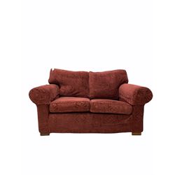 Multiyork - traditional two seat sofa upholstered in claret red fabric with geometric design, raised on block supports W150cm