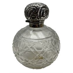 Glass globe scent bottle with silver cover Birmingham 1902, three piece silver , three silver backed brushes Birmingham 1918 and a silver handled button hook