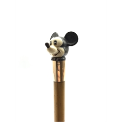 19th/ early 20th century Malacca walking cane, 9ct rose gold collar with a carved ivory and ebony finial in the form of Mickey Mouse, L89cm 