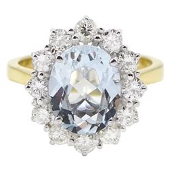 18ct gold oval aquamarine and round brilliant cut diamond cluster ring, hallmarked, aquamarine approx 2.10 carat, total diamond weight approx 0.70 carat