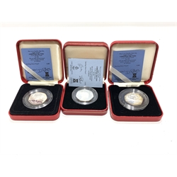 Queen Elizabeth II 1988, 1989 and 1992 Isle of Man silver proof Christmas fifty pence coins, all cased with certificates