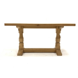 'Mouseman' Yorkshire oak oblong occasional table, with adzed top raised on octagonal turned supports united by stretcher, carved with mouse signature, 91cm x 38cm, H44cm