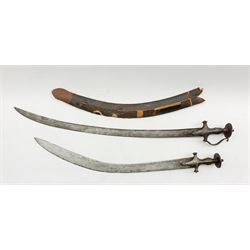 19th Century Indian Tulwar, the curved blade with engraved decoration, length of blade 63cm and another with plain blade