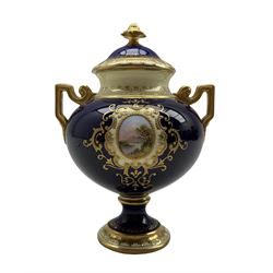 Early 20th century Coalport two handled vase and cover, painted with landscape views within gilded vignettes against a cobalt ground, pattern number V5327, H15cm