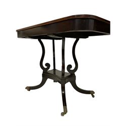 19h century mahogany centre table, the leather inset top, raised on four scrolled supports leading into quadruple base, terminating in brass castors W104cm