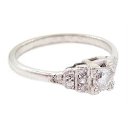 Art Deco white gold single stone diamond ring, in a square setting to diamond set milgrain stepped shoulders, stamped 18ct, principal diamond weight approx 0.25 carat