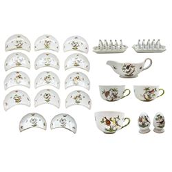Set of fourteen Herend Rothschild Bird pattern crescent shape dishes, pair of toast racks, pair of condiments, sauce boat and three cups (22)