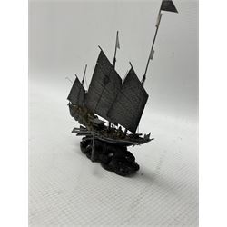 Chinese white metal Junk ship on carved wooden stand, with textured sails, 