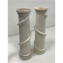 Pair of 20th century white painted oak turned tapering columns, with applied entwined snake decoration (H99cm)
