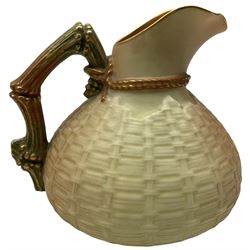 Royal Worcester blush ivory porcelain basket weave jug, relief green gilt-heightened lizard and naturalistic sectioned bamboo handle, shape no. 1714, H15cm