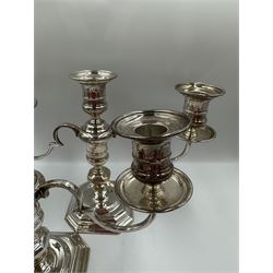 Pair of silver three branch table candelabra with scroll branches and on octagonal bases H21cm Birmingham 1964 Maker Adie Bros. 