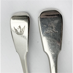 George III silver fiddle pattern sauce ladle London 1819, George IV sauce ladle London 1823 both by Thomas Wilkes Barker, pair of silver gilt serviette rings Birmingham 1957 and an embossed silver cream jug Chester 1902 7.7oz