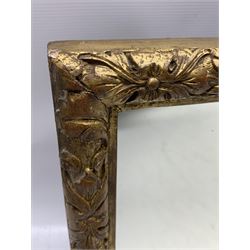 19th century carved giltwood mirror, of rectangular form with scrolling floral and acanthus frame, 59cm x 34cm, together with a stylized embroidered panel, worked in bright threads with exotic birds, a leaping hare and foliage, framed 