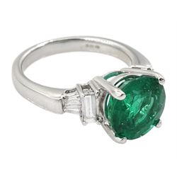 18ct white gold three stone round emerald, baguette and tapered baguette cut diamond ring, hallmarked, emerald approx 3.10 carat