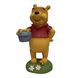 Quantity of Winne the Pooh figures and collectables including snow globes, collectors plates, musical boxes, biscuit jars etc in two boxes