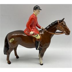 Beswick model of a Huntsman on a brown horse 1501 style two, four Beswick Foxhounds and a large Fox 1016a (6)