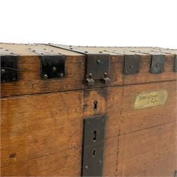 Large late 19th century oak and metal bound silver chest, with brass plaque inscribed 'Robertson, of Kindeace.', fitted with two wrought metal carrying handles 