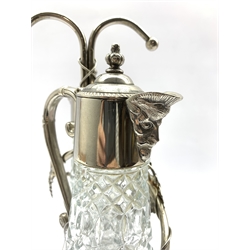 Silver plated two division decanter stand with vine decoration and two glass claret jugs with plated covers