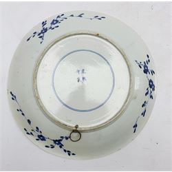 Late 19th/20th Century Chinese charger decorated with huntsmen in blue and white D30cm with character mark to base