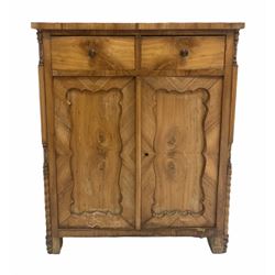 Continental walnut dressing chest, the top fitted with a large swing mirror, candle sconce brackets and two drawers, over a slide and four drawers to base, (W101cm, H205cm, D54cm) together with a small Continental walnut cupboard (W67cm)