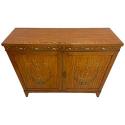 Edwardian satinwood side cabinet, rectangular top hand painted with trailing foliate and intertwined ribbon, enclosed by two panelled doors painted with laurel leaf wreaths, ribbons and scrolled lyres, the interior fitted with a single shelf, on bracket feet