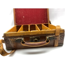 Early 20th Century brass bound leather cartridge case initialled 'C.B.H.' the oak lined base with five compartments, leather straps and outer leather straps 39cm x 30cm x 13cm